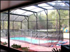 For extra child safety, we installed a safety fence around this young family's pool inside of their Dome-Style Pool Enclosure
